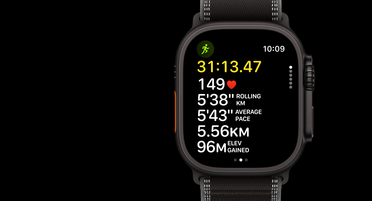 Apple Watch Ultra 3, black color, titanium case, Workout app, Outdoor Run, left side exterior, Action button, right side exterior, Digital Crown, side button, band, Trail Loop, black/charcoal color